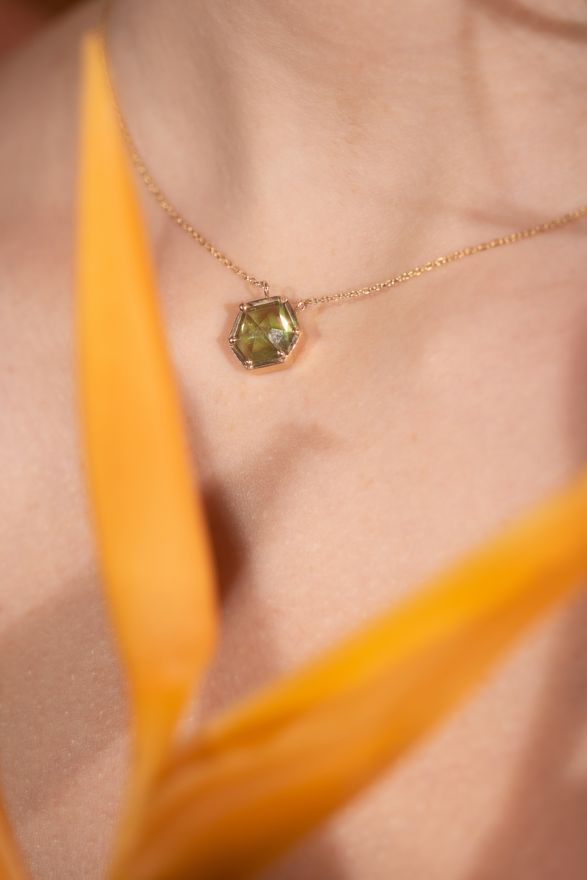 Model wears Pebble / Peridot Freeform Pendant