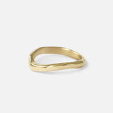 Side view of Root Curve Band by Kestrel Dillon in 14k yellow gold