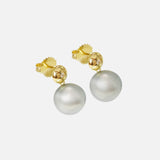 Side view of Umi / Button Round Earrings