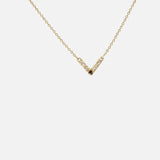 Front view of White and Black Diamond Pendant in 14k yellow gold