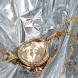 Lifestyle shot of Reflection Pendant