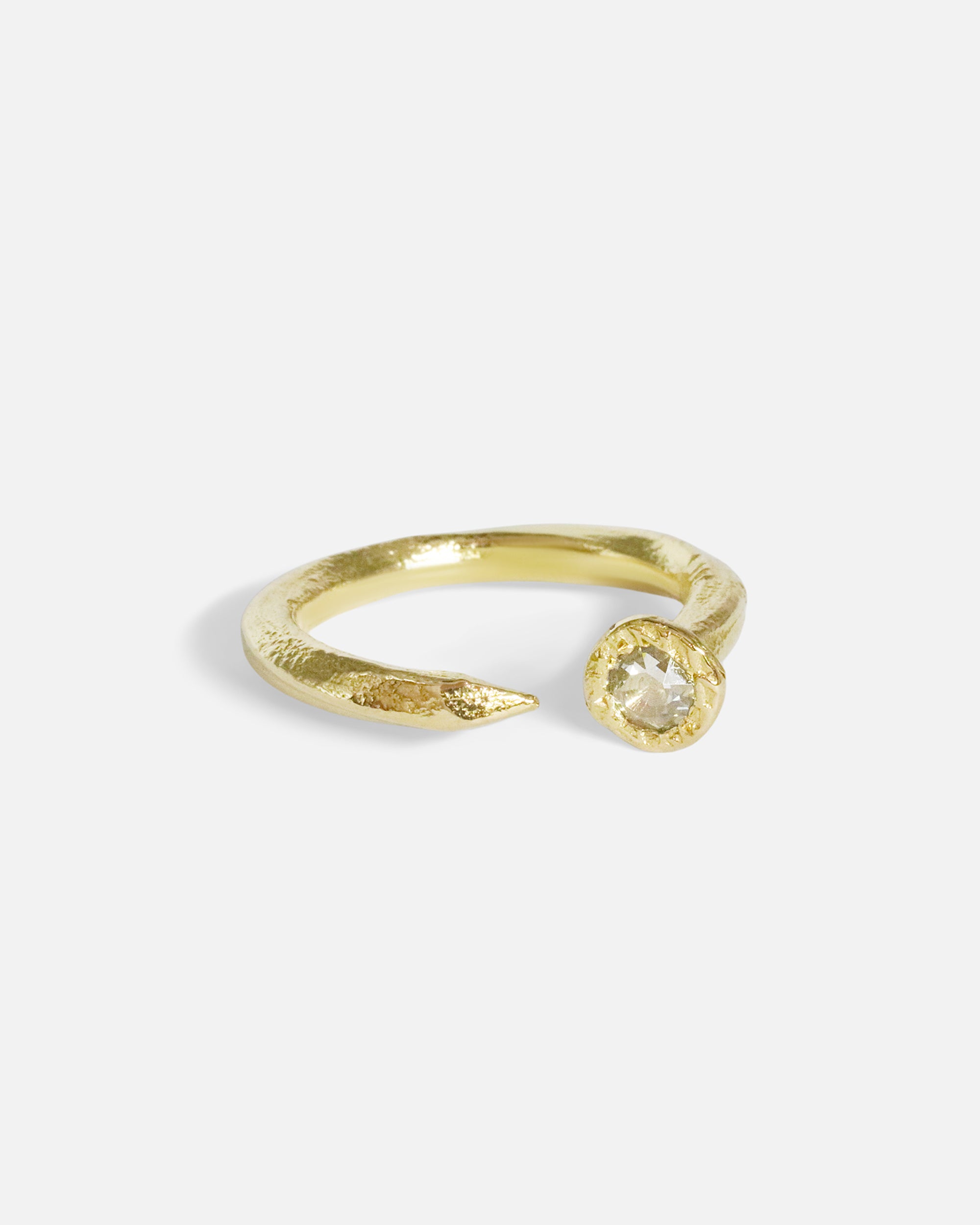 Side view of Diamond Twisted Nail Ring in 14k yellow gold by Ides