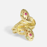 Close side view of Duo Ophidia Sapphire Ring in 14k yellow gold by Ides
