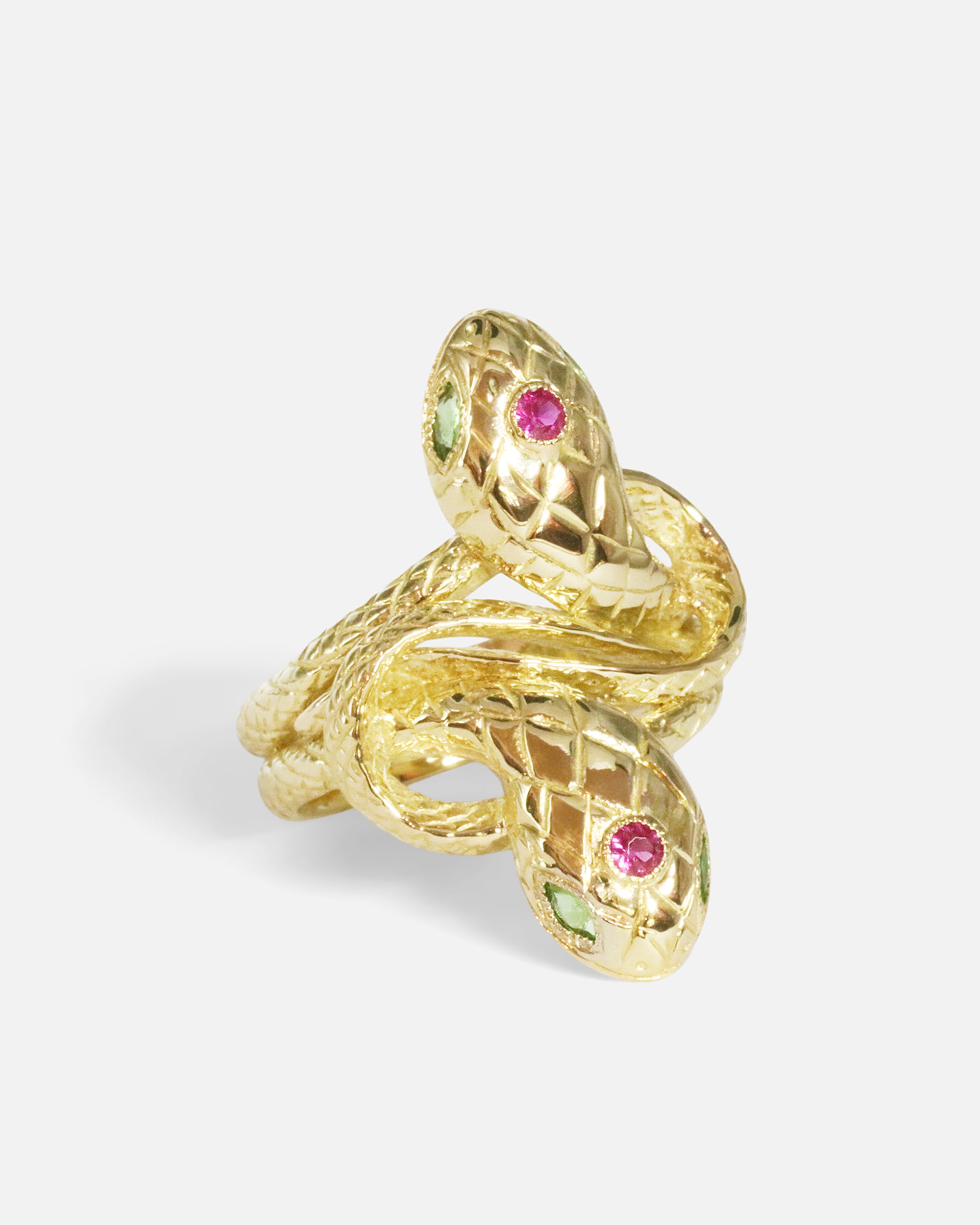 Close side view of Duo Ophidia Sapphire Ring in 14k yellow gold by Ides