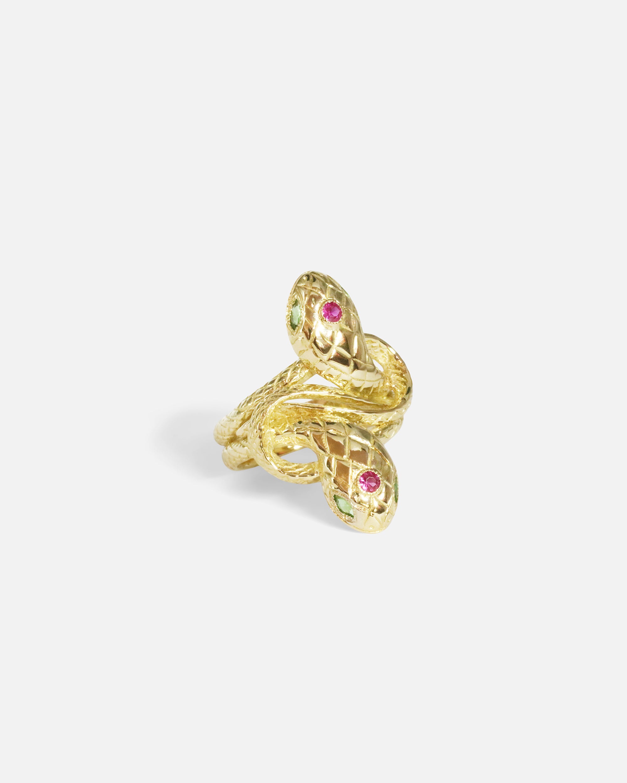 Side view of Duo Ophidia Sapphire Ring in 14k yellow gold by Ides