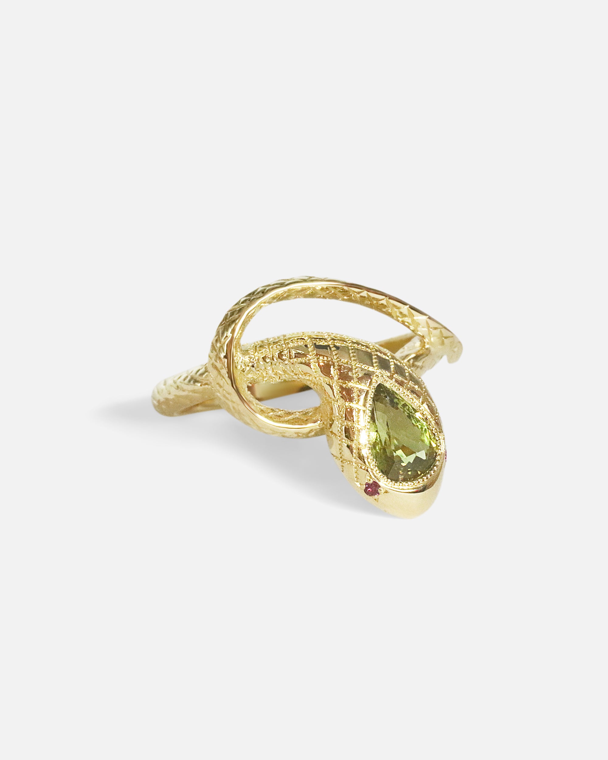 Side view of Ornata Ophidia Pear Ring / Green Sapphire in 14k yellow gold by Ides