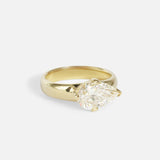 Angled view of Comet Ring / Lab Pear Diamond in 14k yellow gold by Joko