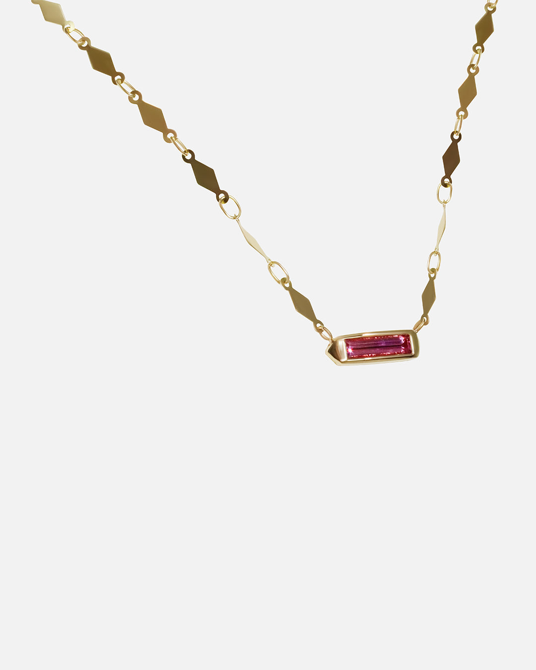 Side view of Hard Candy Necklace / Sapphire in 14k yellow gold by Joko