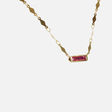 Side view of Hard Candy Necklace / Sapphire in 14k yellow gold by Joko