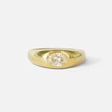 Front view of Optic Oval Signet Ring / Diamond in 14k yellow gold by Joko