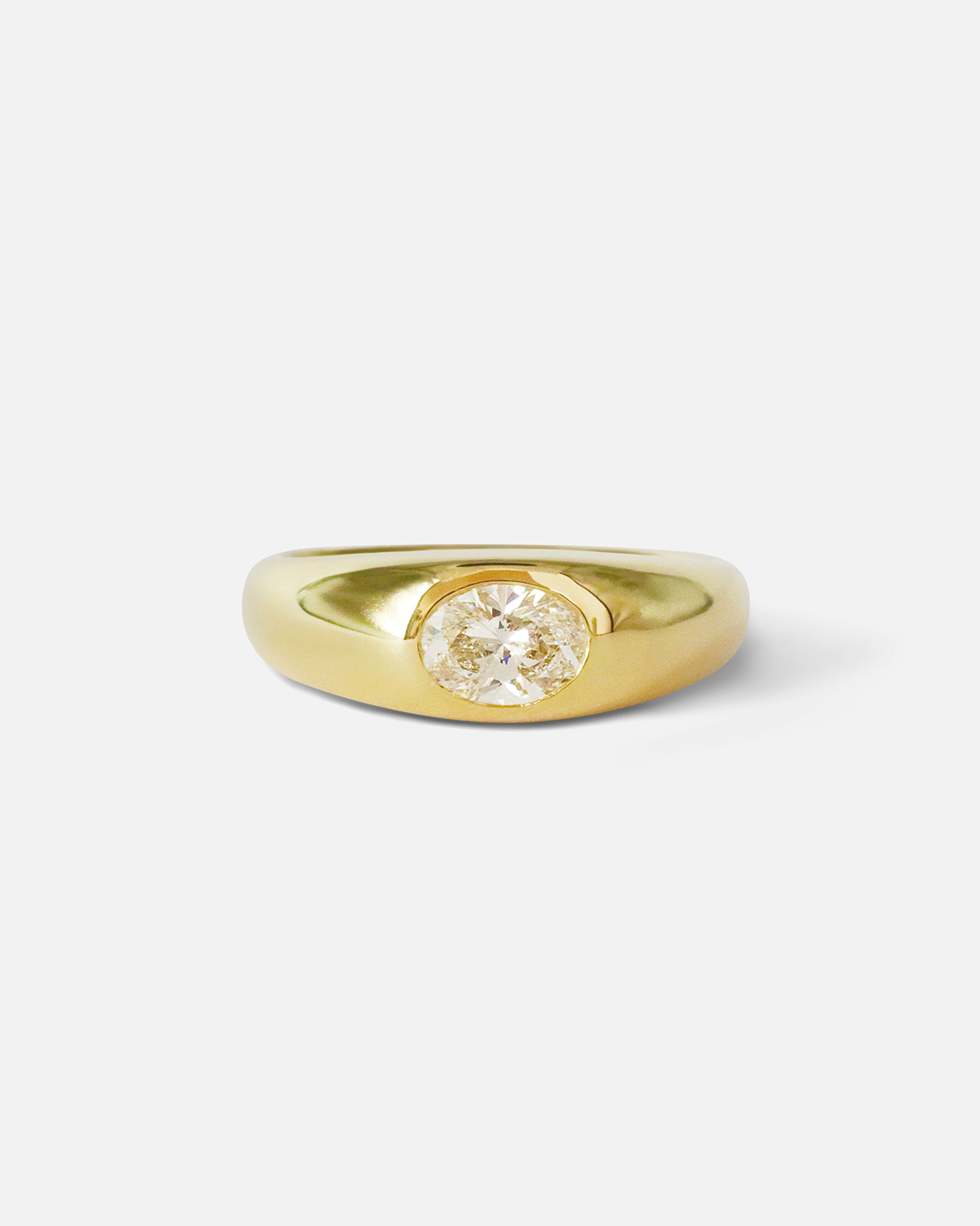 Front view of Optic Oval Signet Ring / Diamond in 14k yellow gold by Joko