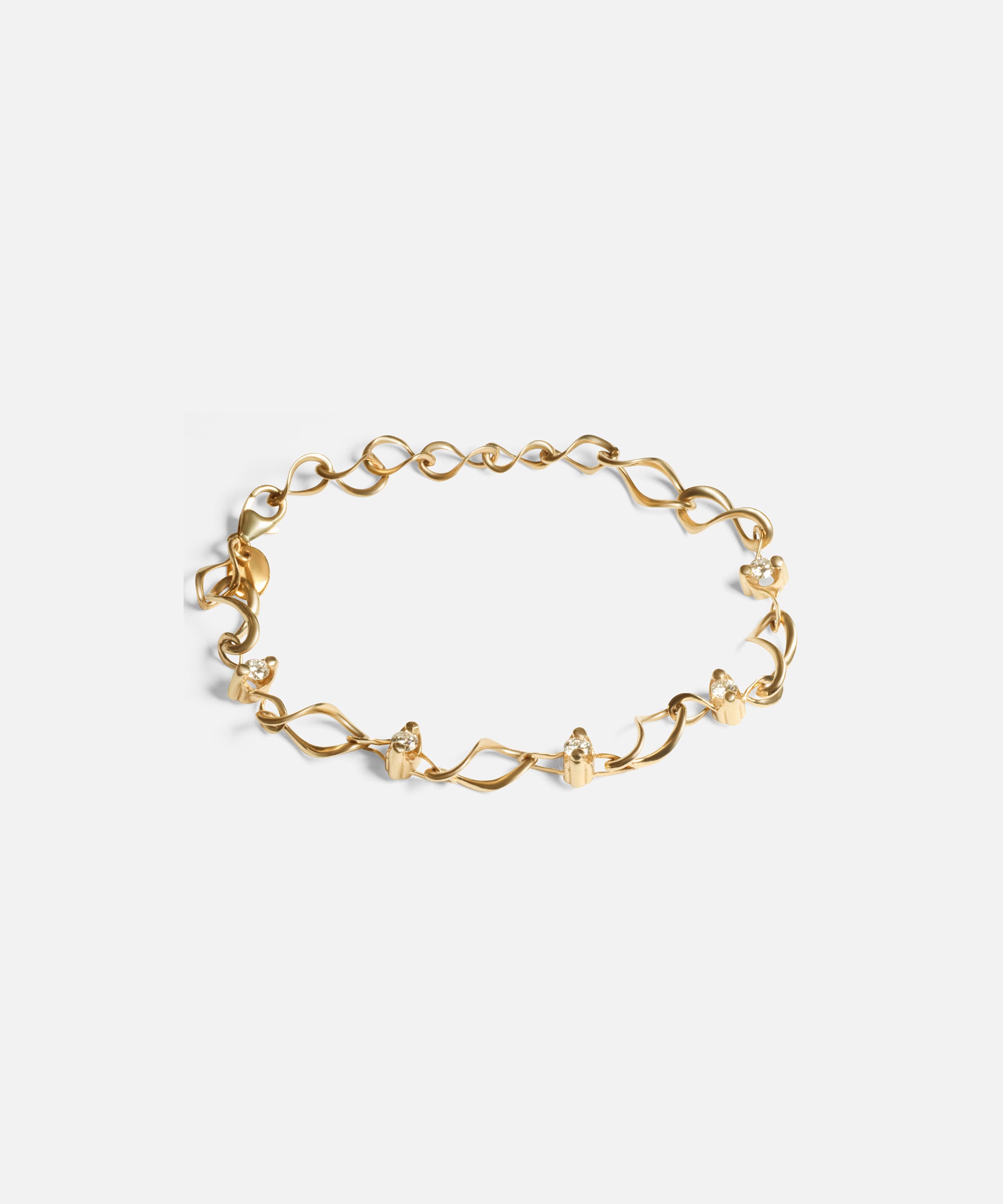 Side view of Locus Intermittendi Bracelet in 14k yellow gold By Lucia B Marti
