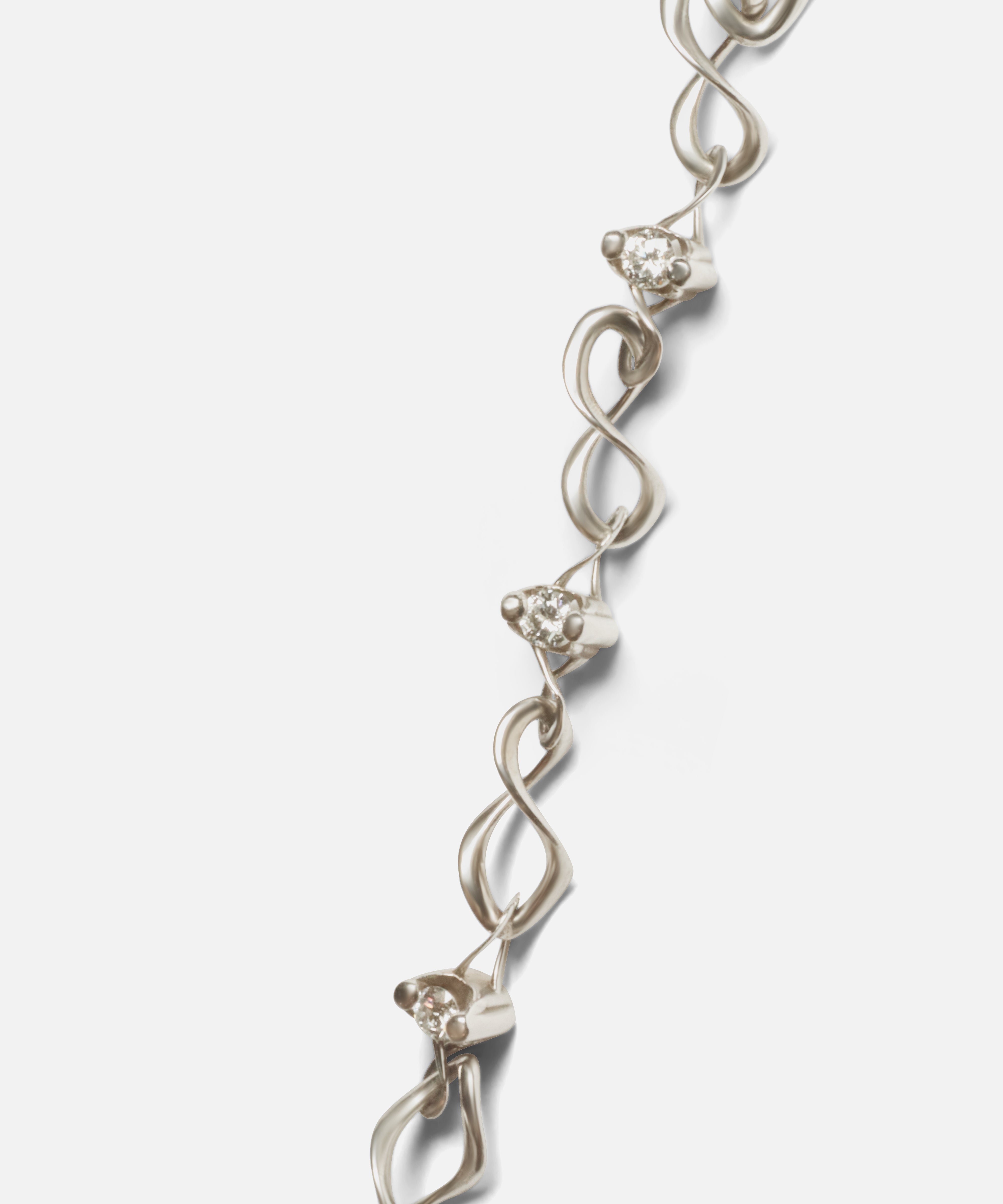 Close up view of Locus Intermittendi Bracelet in 14k white gold By Lucia B Marti