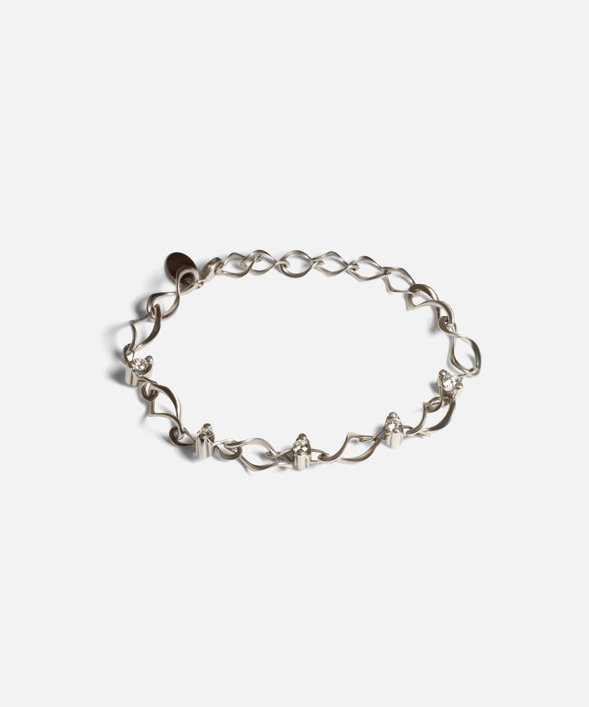 Front view of Locus Intermittendi Bracelet in 14k white gold By Lucia B Marti