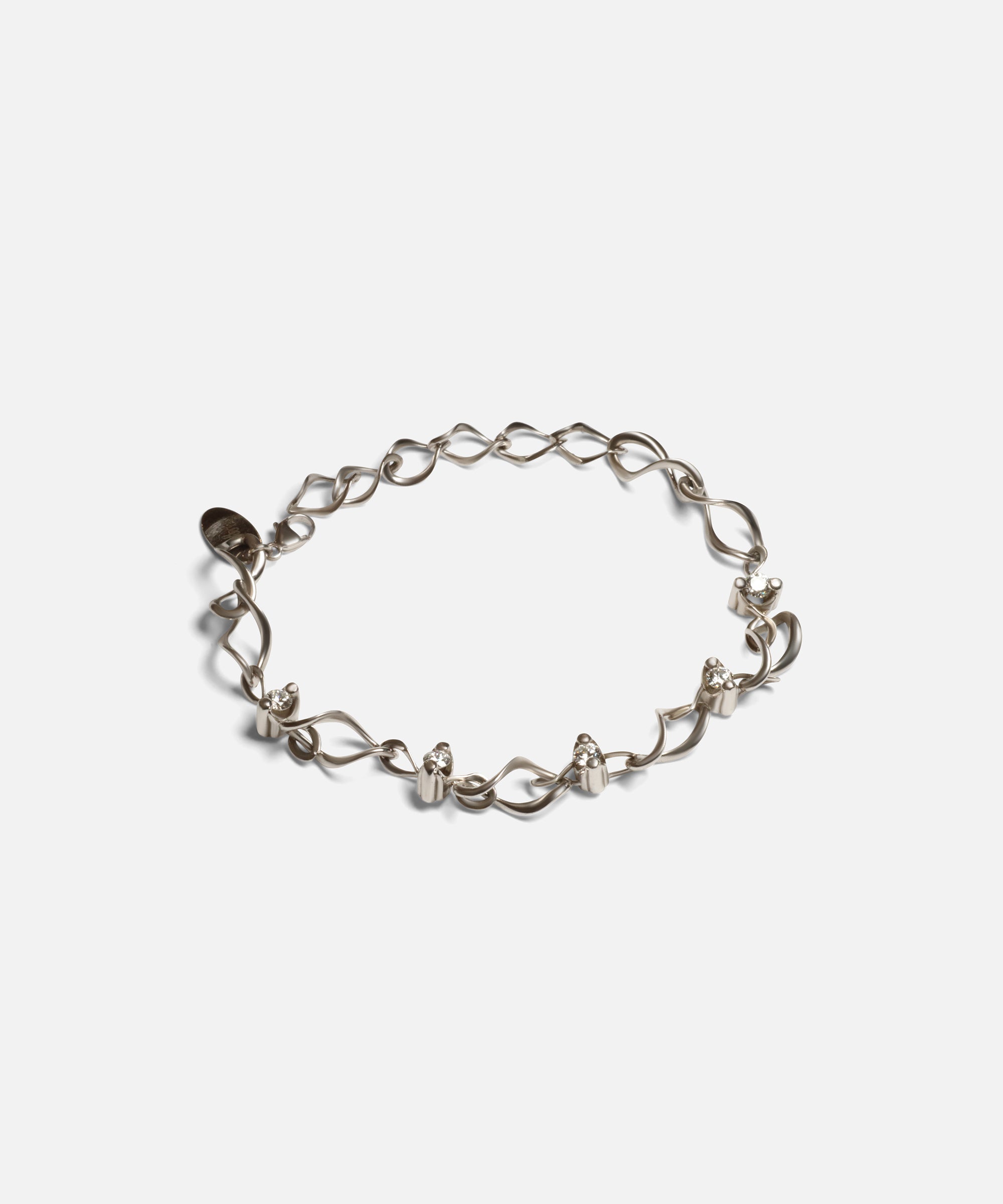 Side view of Locus Intermittendi Bracelet in 14k white gold By Lucia B Marti