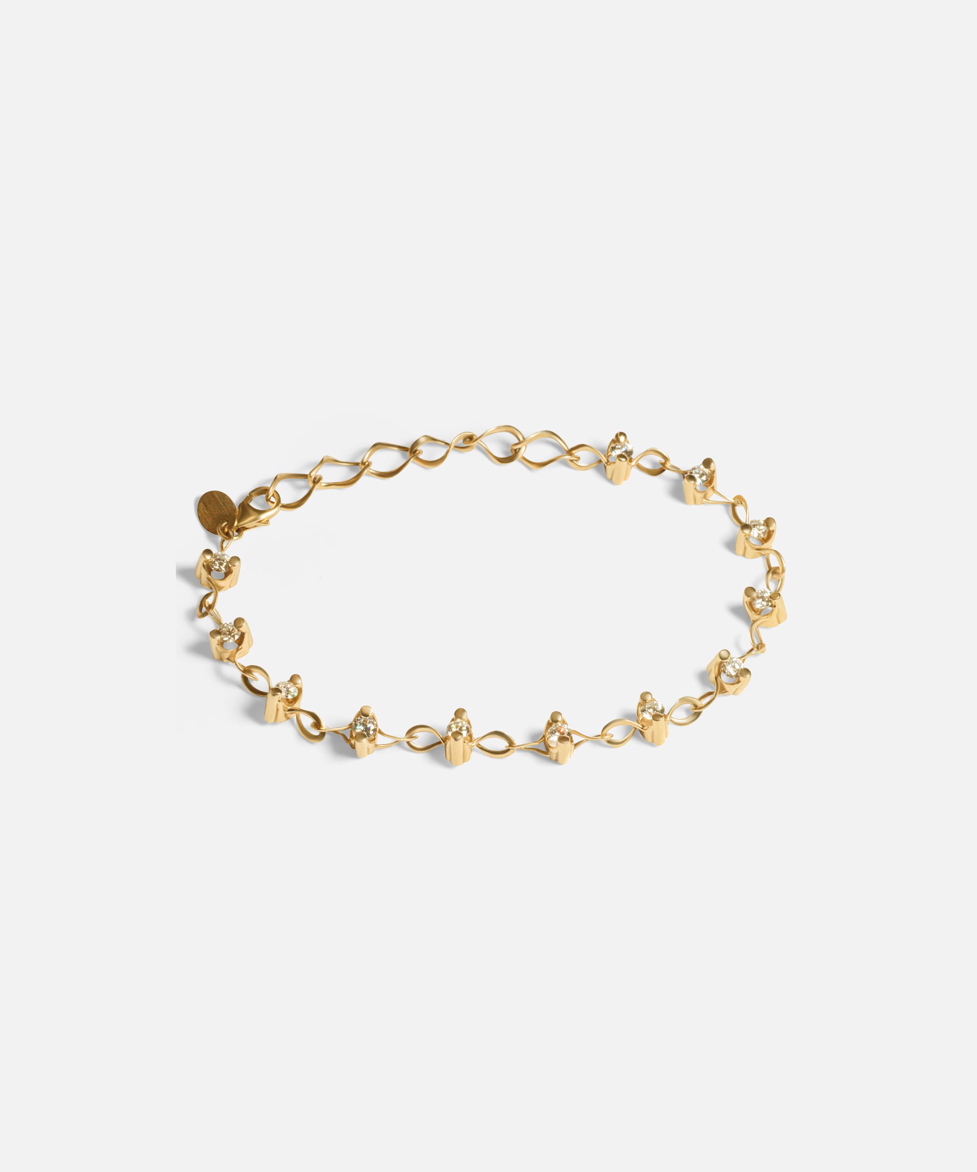 Front view of Locus Intermittendi Bracelet	in 14k yellow gold by Lucia B Marti