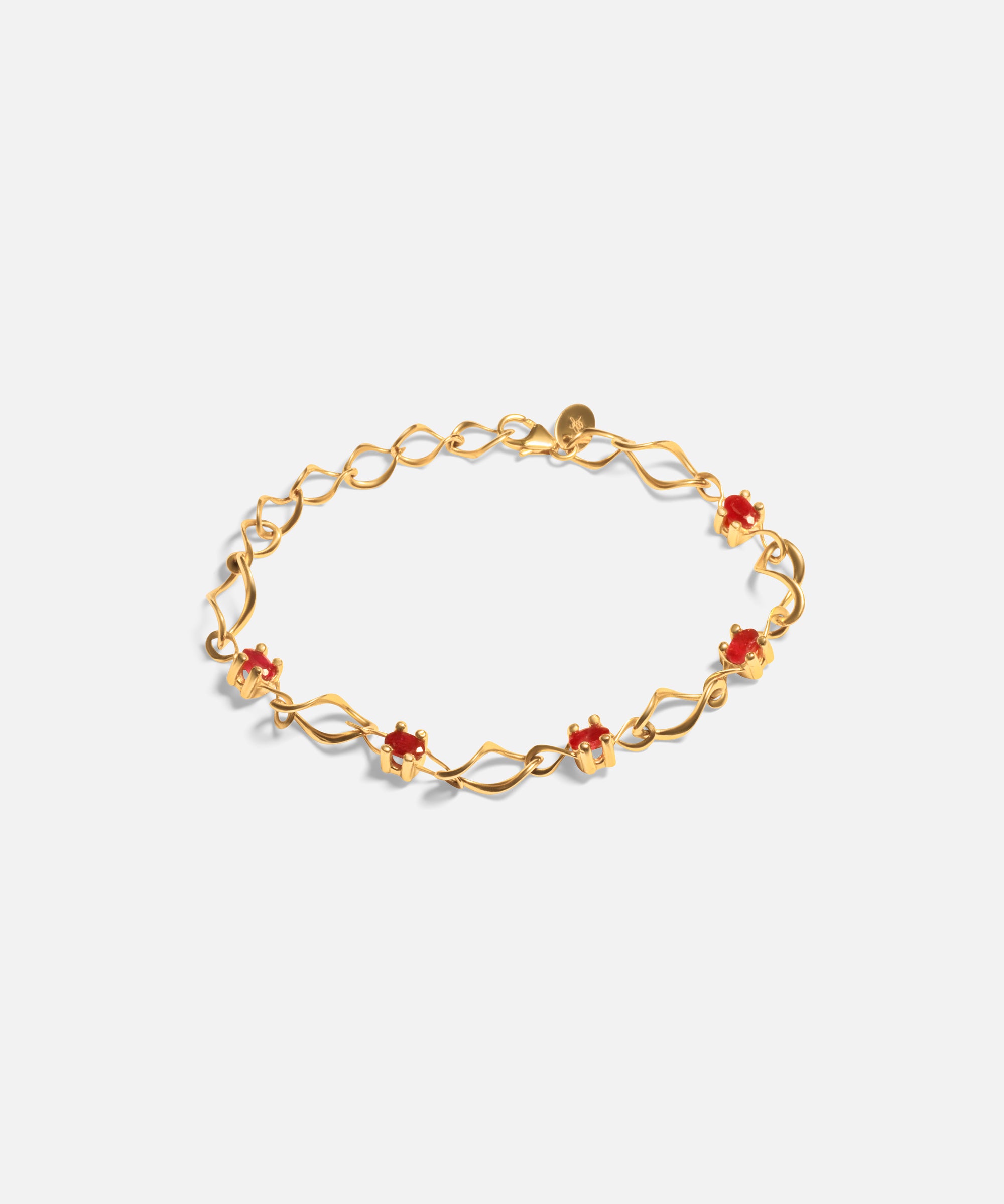 Front view of Nucleus Intermittendi Bracelet / Ruby in 14k yellow gold by Lucia B Marti