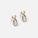 Side view of Mutation Earrings / Pearl & Diamond in 14k white gold by Lucia B Marti