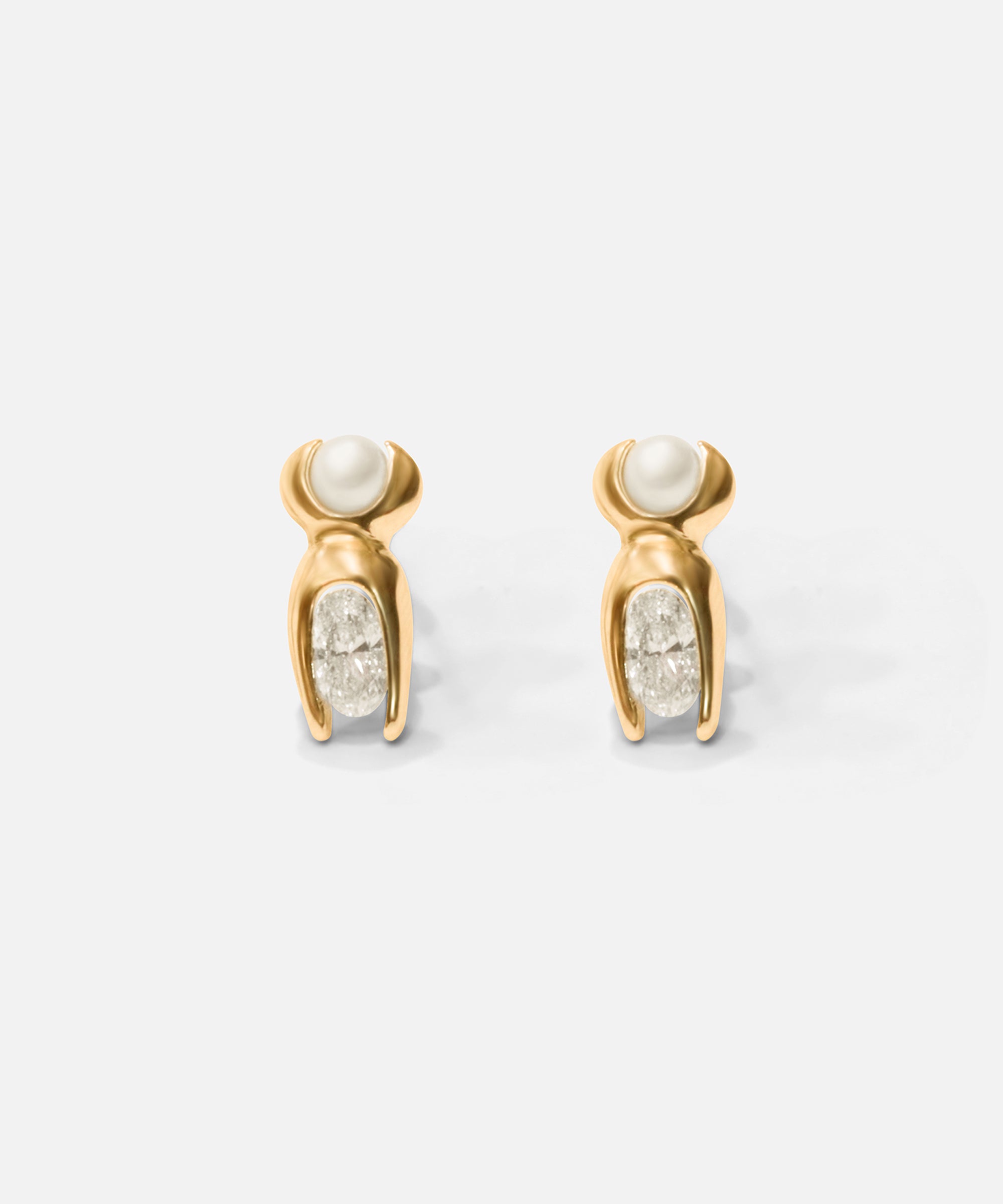 Front view of Mutation Earrings / Pearl & Diamond in 14k yellow gold by Lucia B Marti