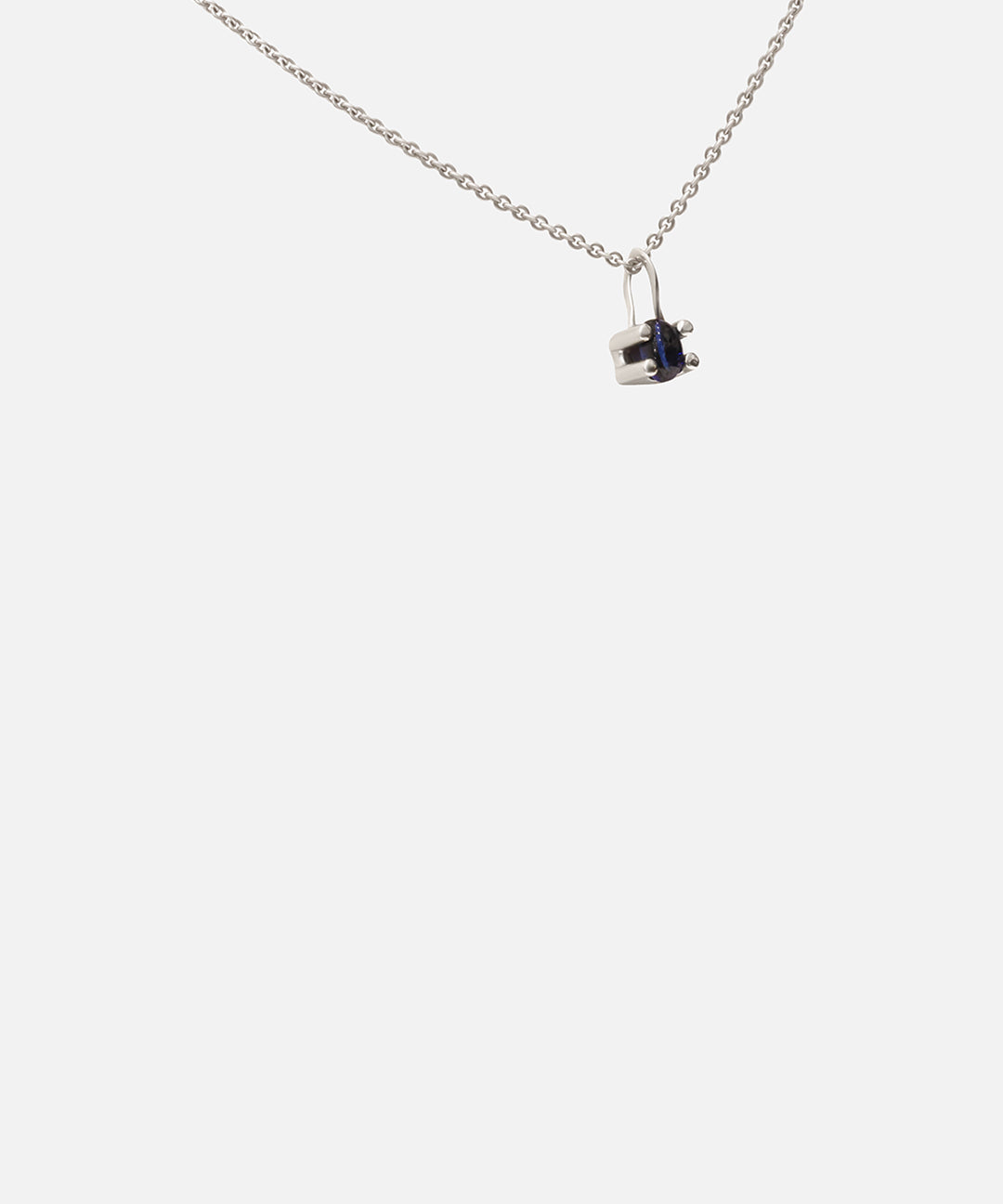 Side view of Nucleus Pendant / Sapphire by Lucia B Marti