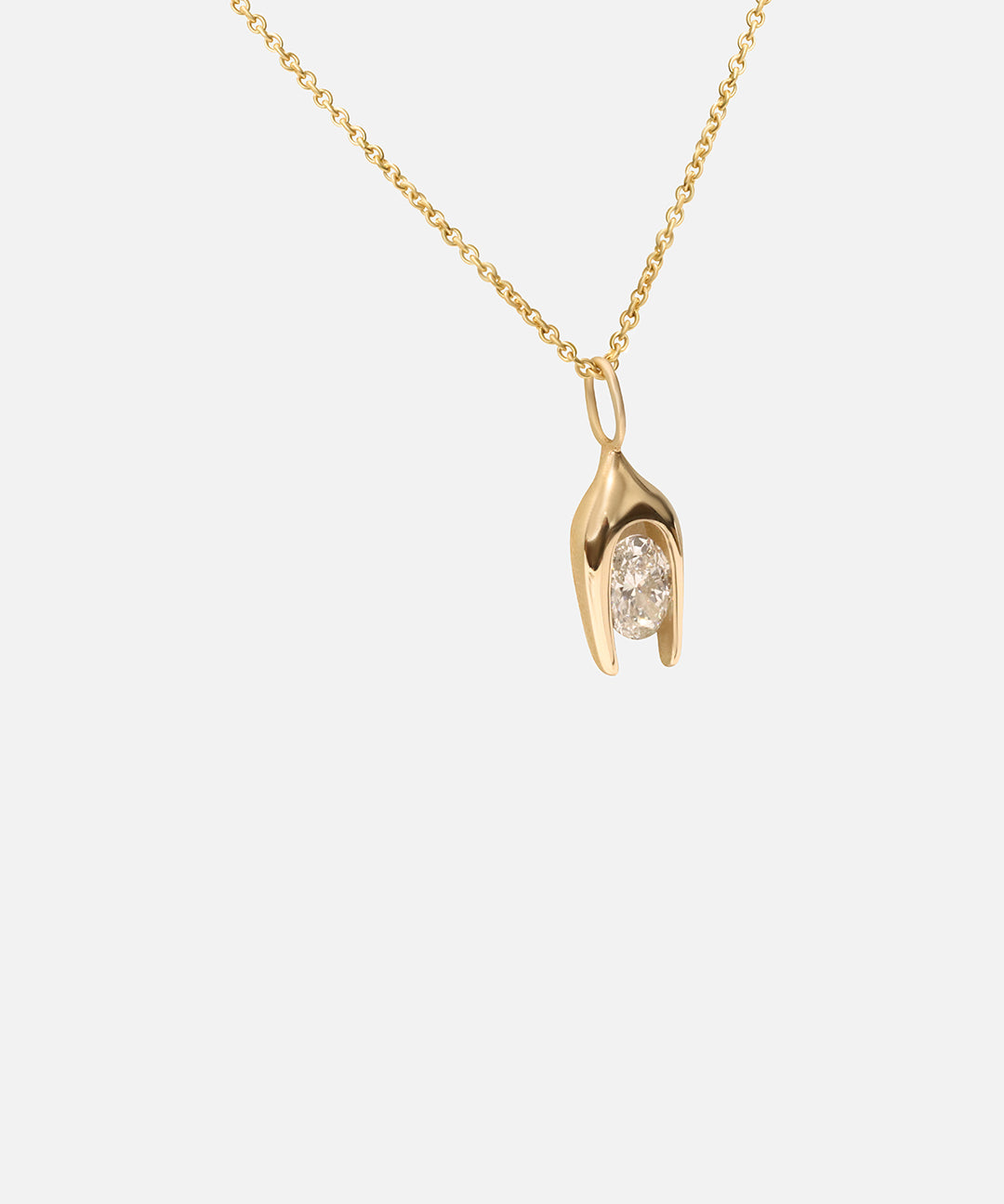 Side view of Y Oval Pendant in 14k yellow gold by Lucia B Marti