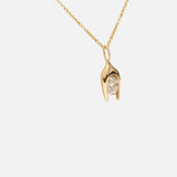 Side view of Y Oval Pendant in 14k yellow gold by Lucia B Marti