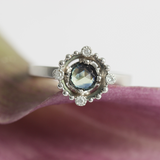 Lifestyle shot of Melee Halo / E11 Bi-Color Sapphire in platinum