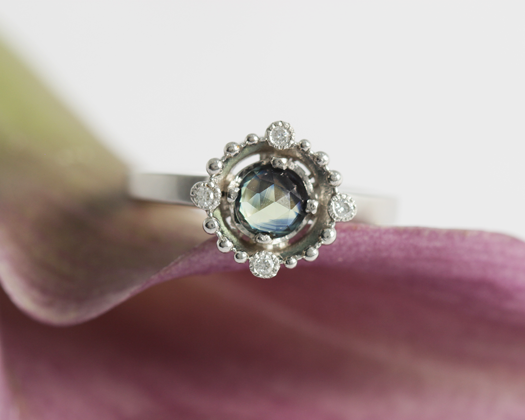 Lifestyle shot of Melee Halo / E11 Bi-Color Sapphire in platinum