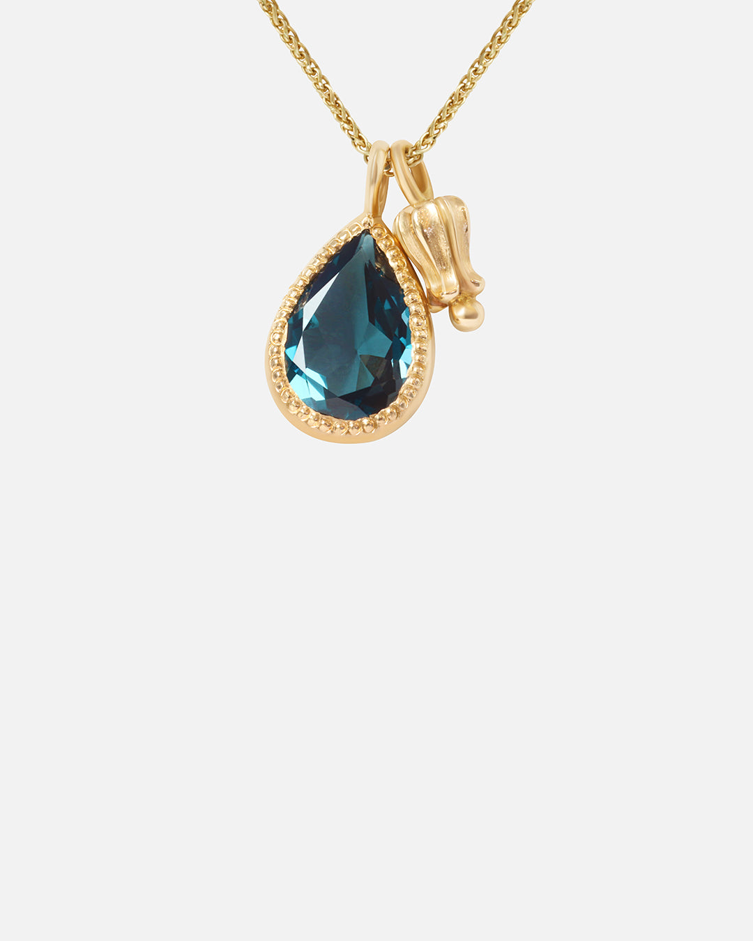 Close view of Little Mirror and Topaz Pendant