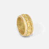 Angled ertical view of Skulls In A Line Band / Pave White Diamonds showcasing inner engravings by Fitzgerald Jewelry