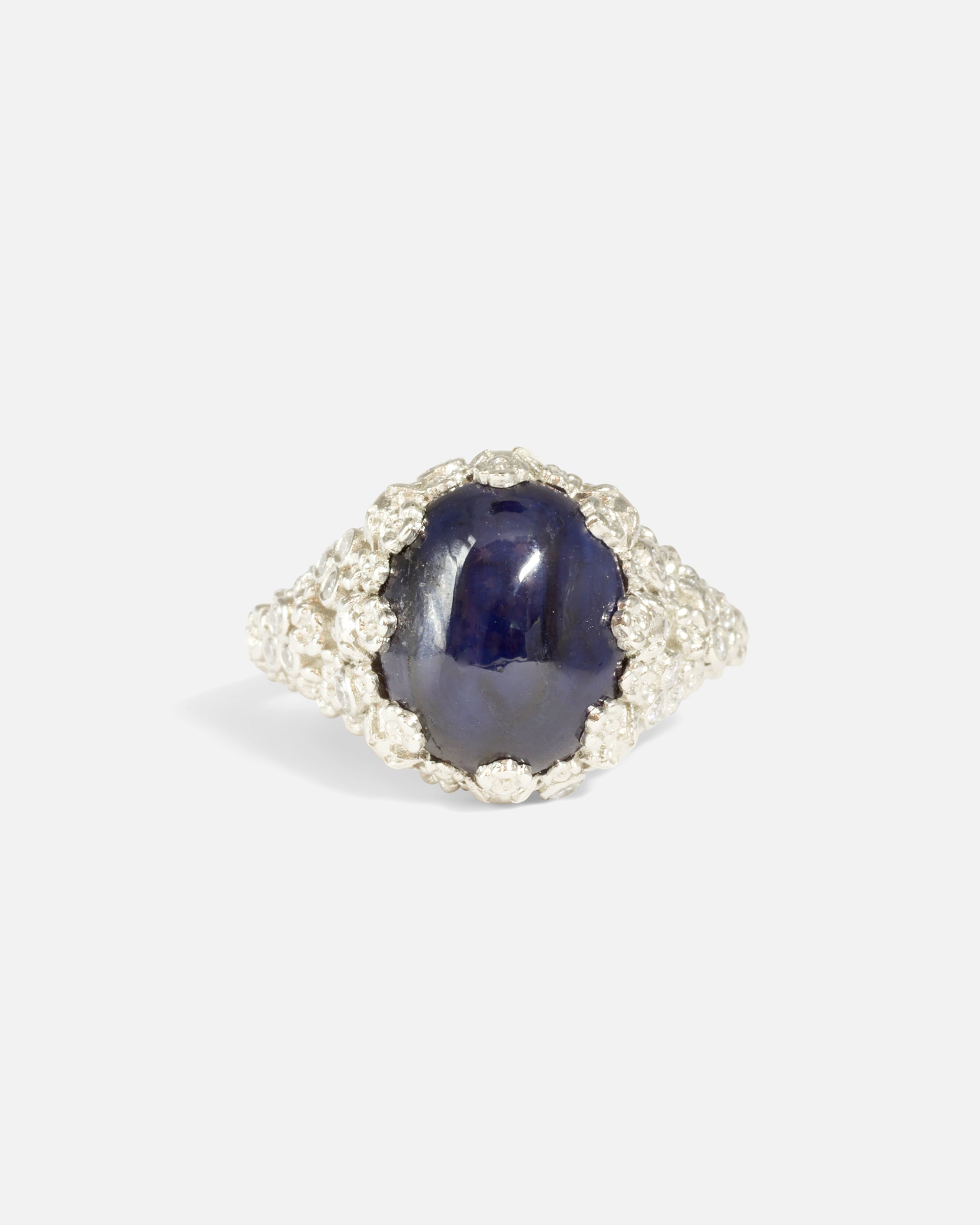 Front view of Skulls & Flowers / Sapphire & Diamond Ring by Fitzgerald Jewelry