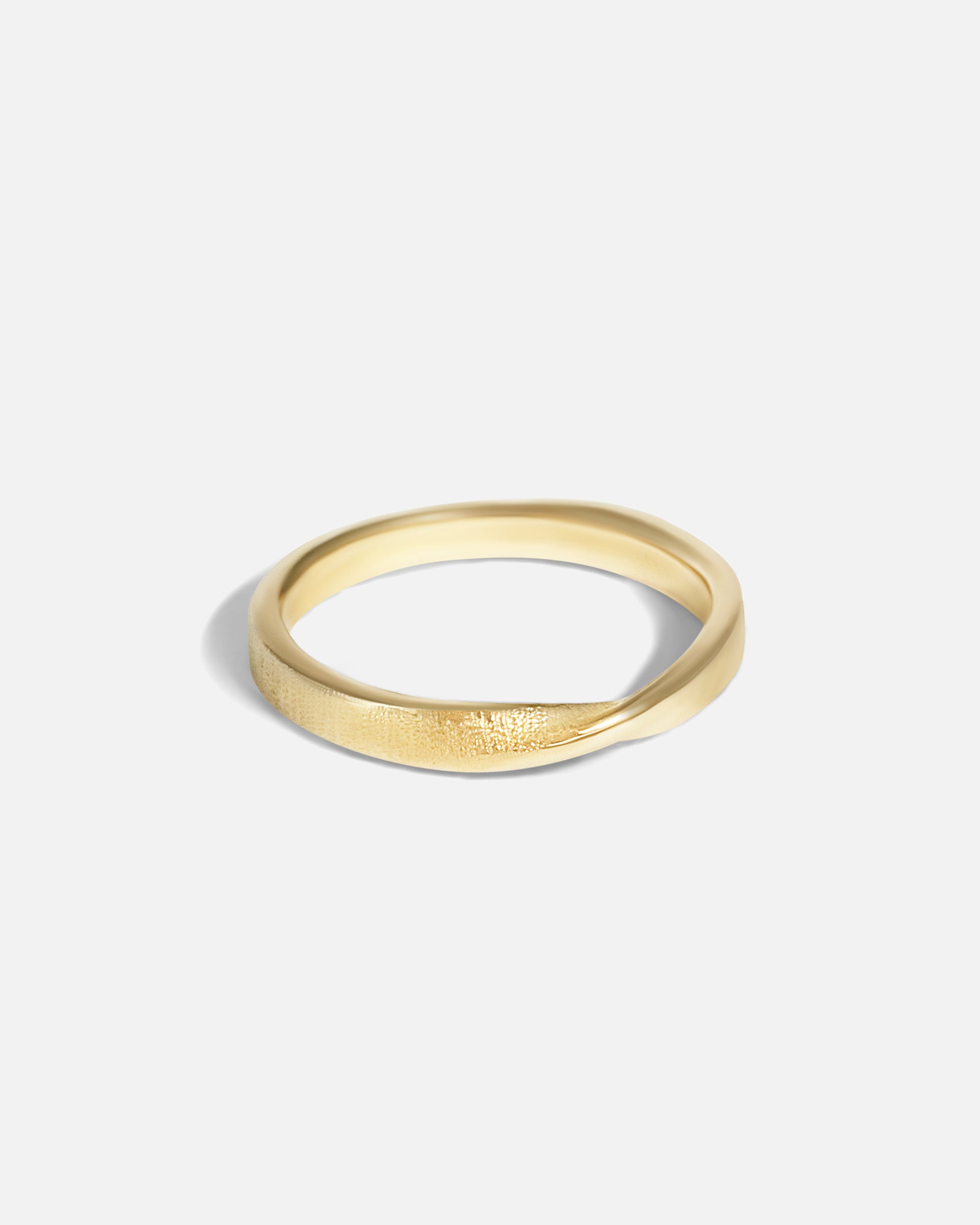 Side view of Hwan Twist Ring by Young Sun Song in 14k Brown Gold