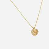 Side view of Lotus Necklace in 14k yellow gold