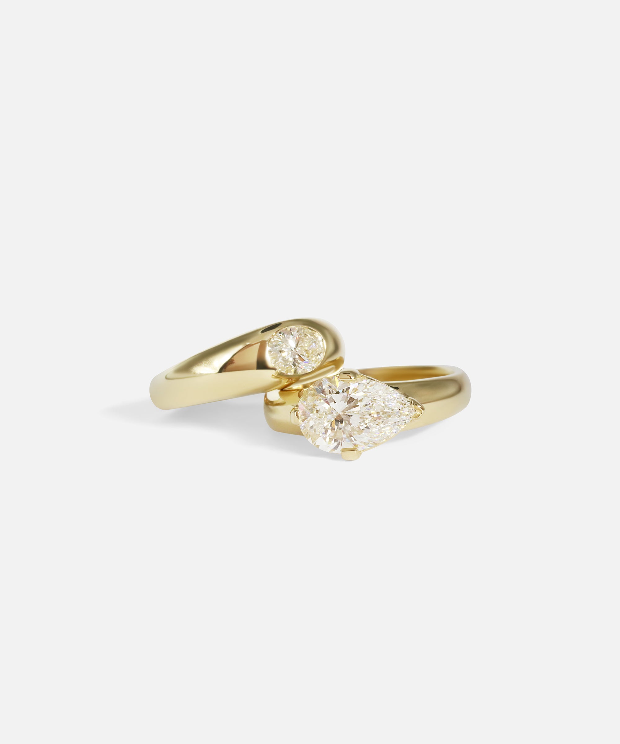 Group stacked shot Optic Oval Signet Ring / Diamond in 14k yellow gold and Comet Ring / Lab Pear Diamond in 14k yellow gold by Joko