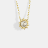 Front view of Skull Pass Thru Pendant in 18k yellow gold