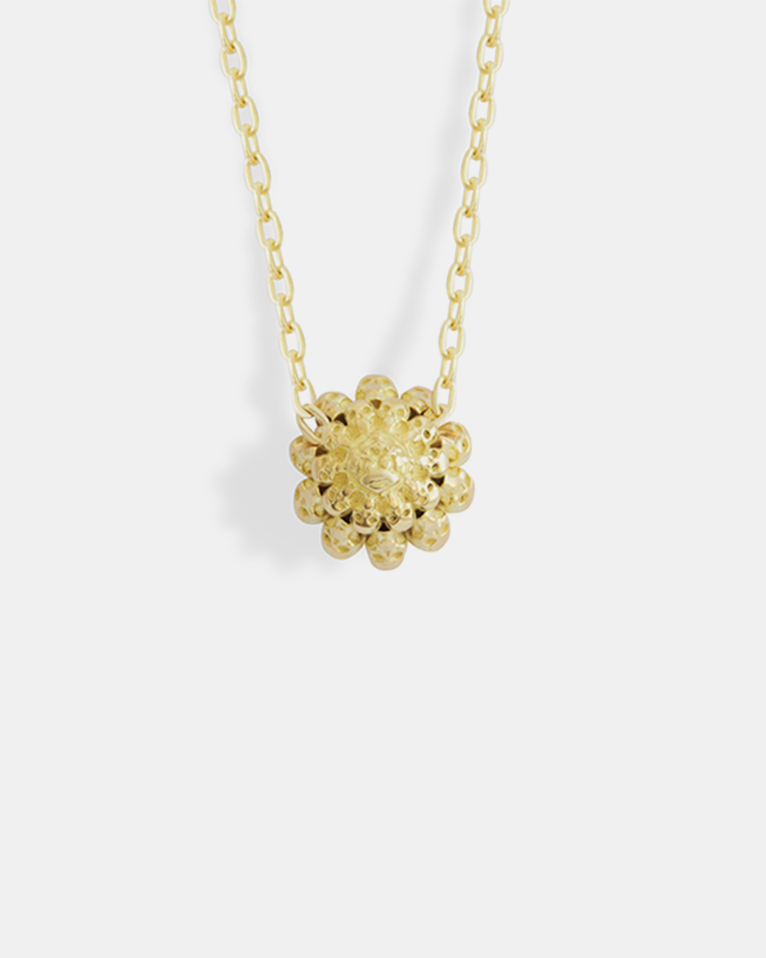 Back view of Skull Pass Thru Pendant in 18k yellow gold