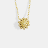 Back view of Skull Pass Thru Pendant in 18k yellow gold