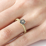 Model wears Skulls At The Rose Ball / Grey Diamond on ring finger