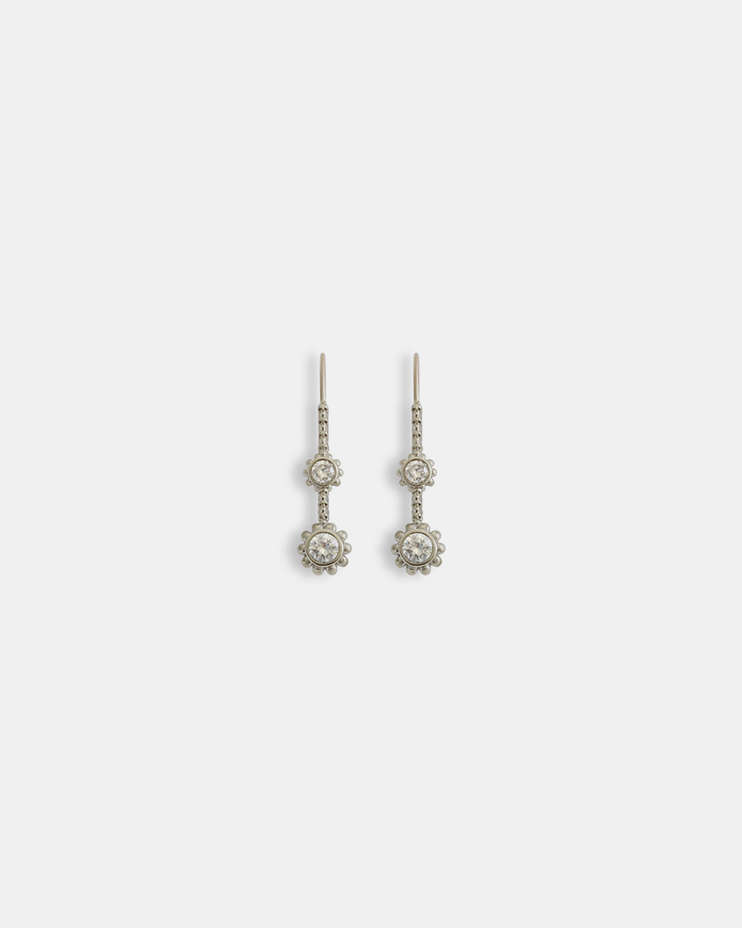 Front view of Skull Double Drop	Earrings in 18k white gold