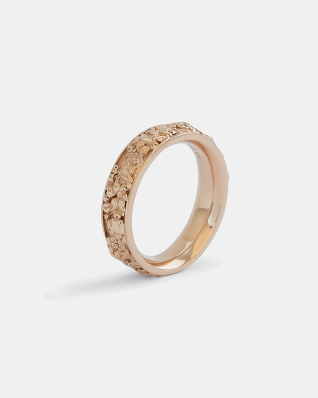 Angled side view of Rose Garden Band in 18k rose gold