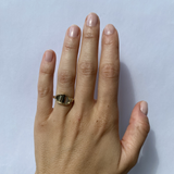 Model wears Reflection Ring III on ring finger