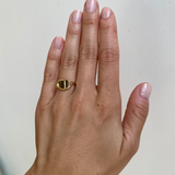 Model wears Reflection Ring I on ring finger