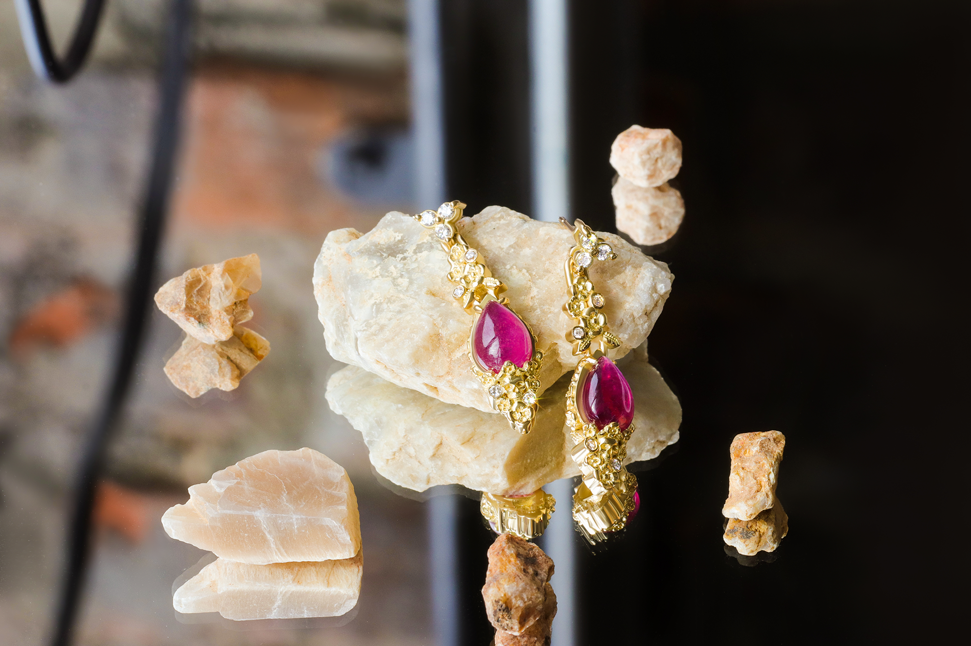 Lifestyle shot of Ruby Skull Drop Earrings