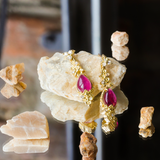 Lifestyle shot of Ruby Skull Drop Earrings