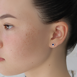 Model wears Pebble Studs / Sapphire By Hiroyo