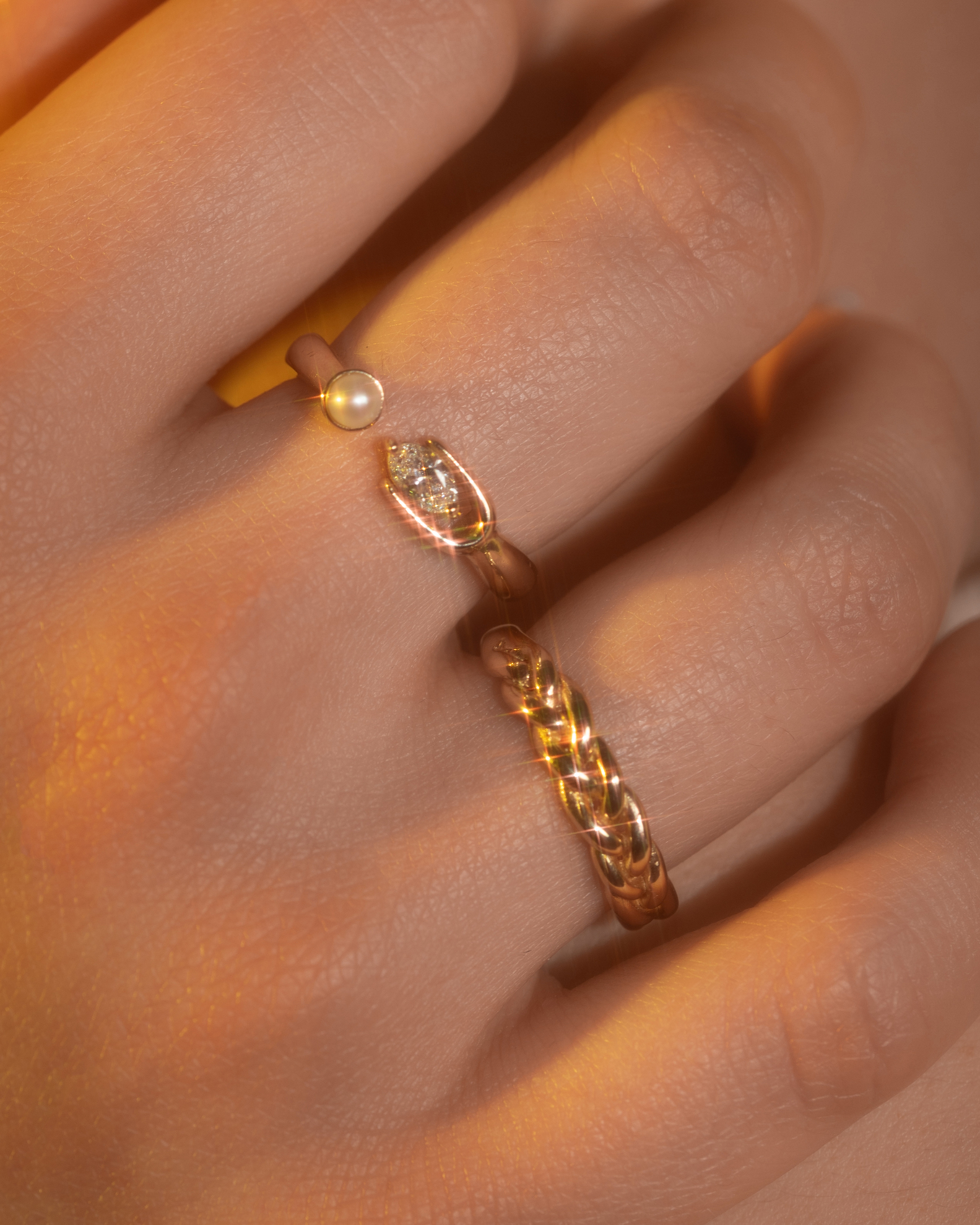 Model wears Gradus Ring by Alfonzo and Chroma Ring by Lucia B Marti