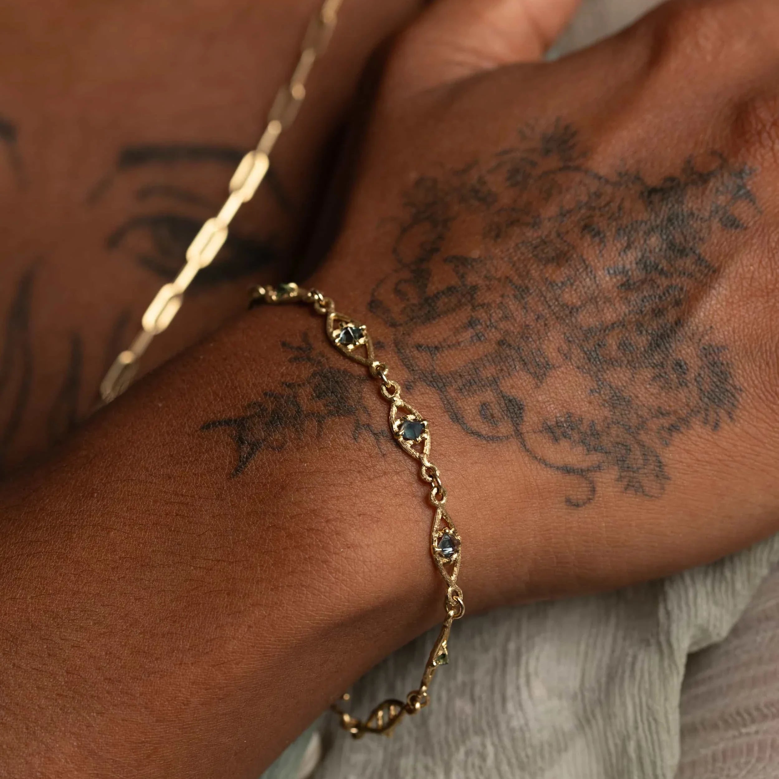 Hand model wearing Silk / Sapphire Pyramid Bracelet by Hiroyo