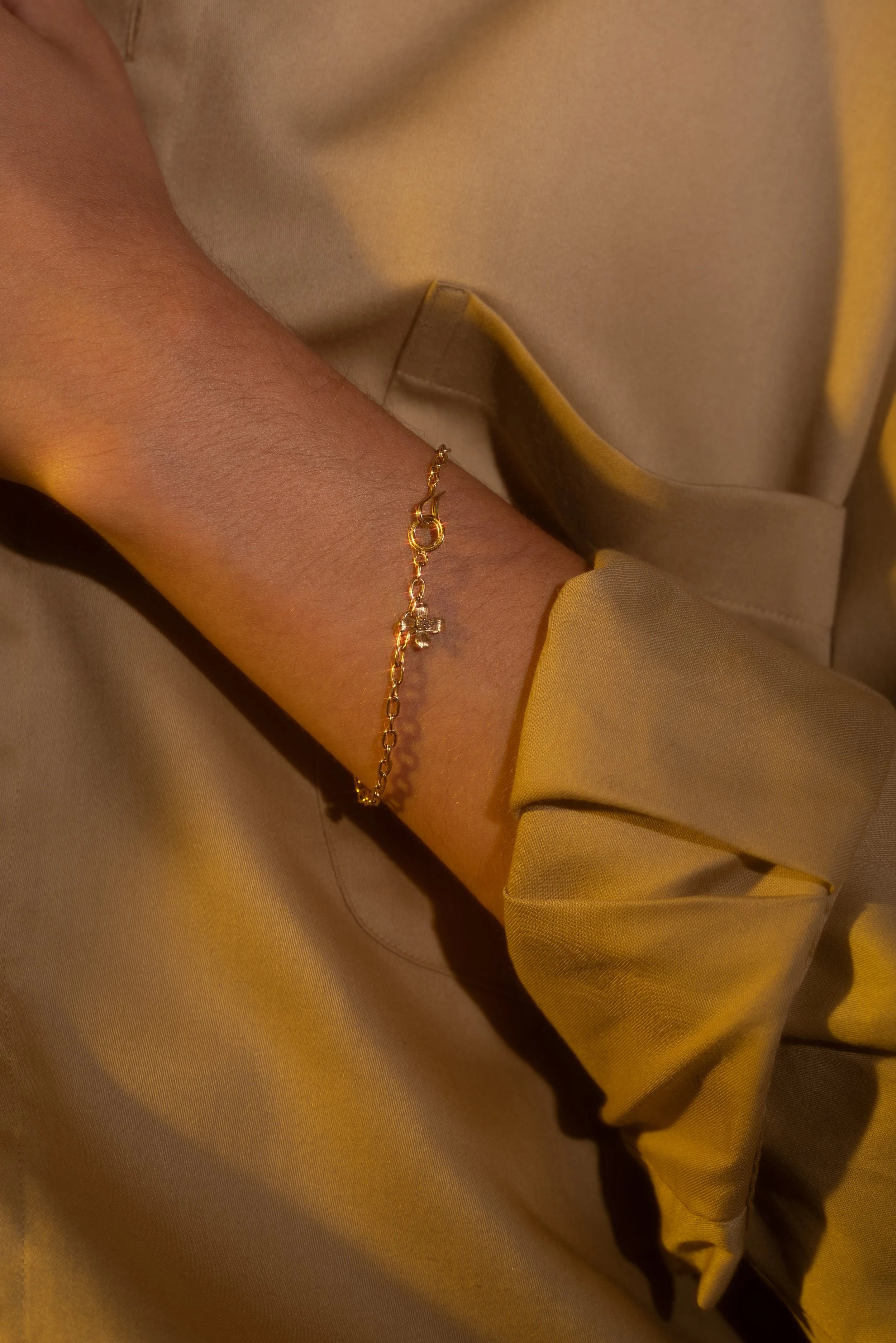 Model wears Handmade Cable Chain / Dogwood Charm by O Channell Designs