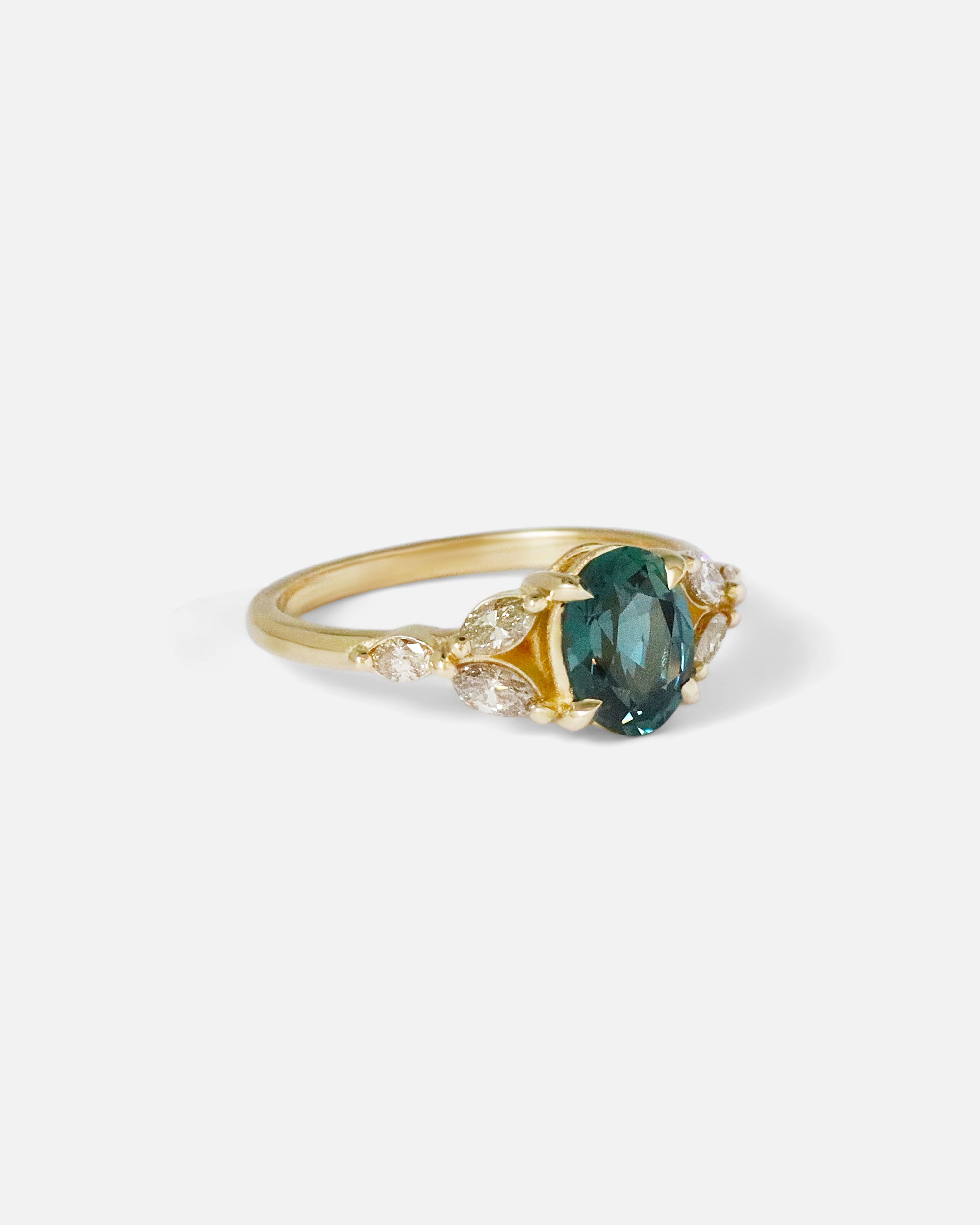 Angled side view of Aster Ring / Teal Sapphire & Champagne Diamond by Kestrel Dillon