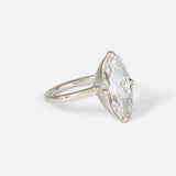 Angled side view of Dew 55 / Modified Oval Cut Diamond Ring by Hiroyo